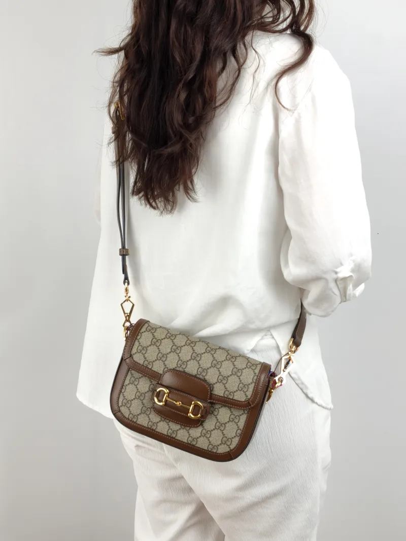 GUCCI Crossbody Bag Horsebit 1955 Horsebit Small Monogram PVC Small 20.5 × 5 × 14.5 cm — on-model view 2 of 2