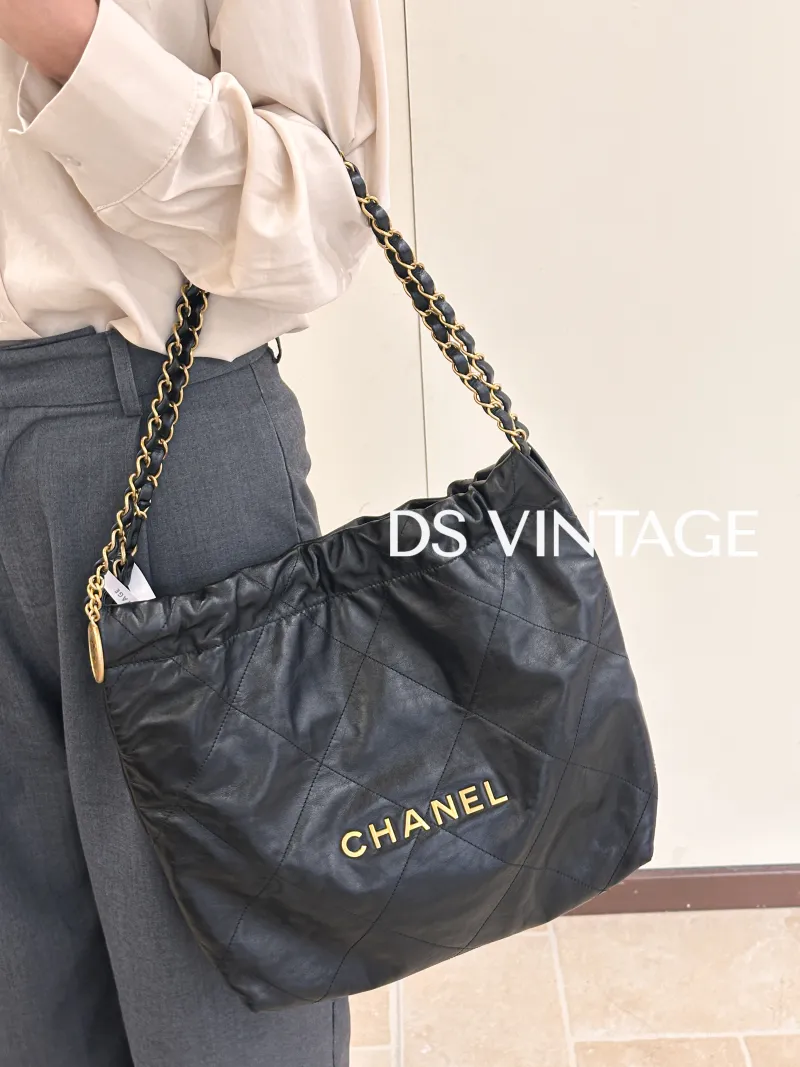 Chanel Shoulder Bag 22Bag Black CC alfskin Small 35 × 7 × 37 cm — on-model view 2 of 3