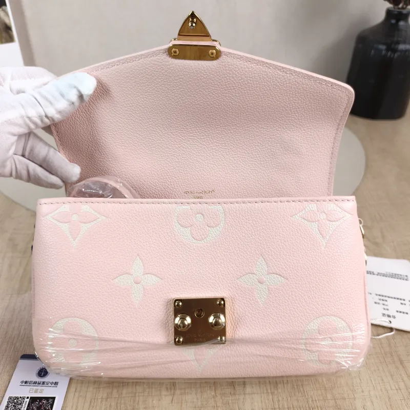 Louis Vuitton Crossbody Bag Pochette Métis East West Monogram Empreinte Embossed Calfskin Small 21.5 × 6 × 13.5 cm — detail view 1 of 12
