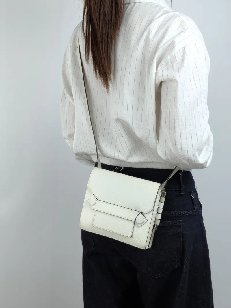 Hermès Crossbody Bag Twins 10 Evercolor Calfskin One Size 18 × 6 × 16 cm D — on-model view 2 of 2