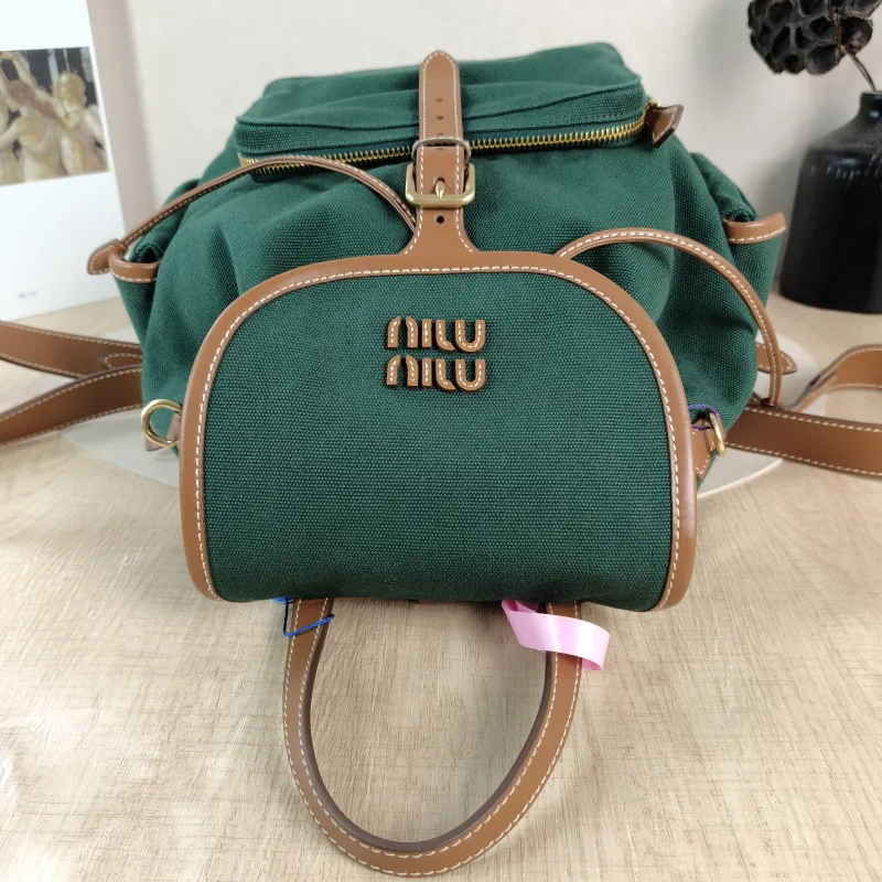 Miumiu Backpack Backpack Green Canvas Large 25 × 12.5 × 29.5 cm — detail view 1 of 12