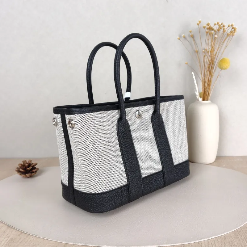 Hermès Top Handle Bag Neo Garden 23 Mini Black · Beige Canvas · Negonda Calfskinmini23 × 10 × 16 cm — cover view 4 of 6