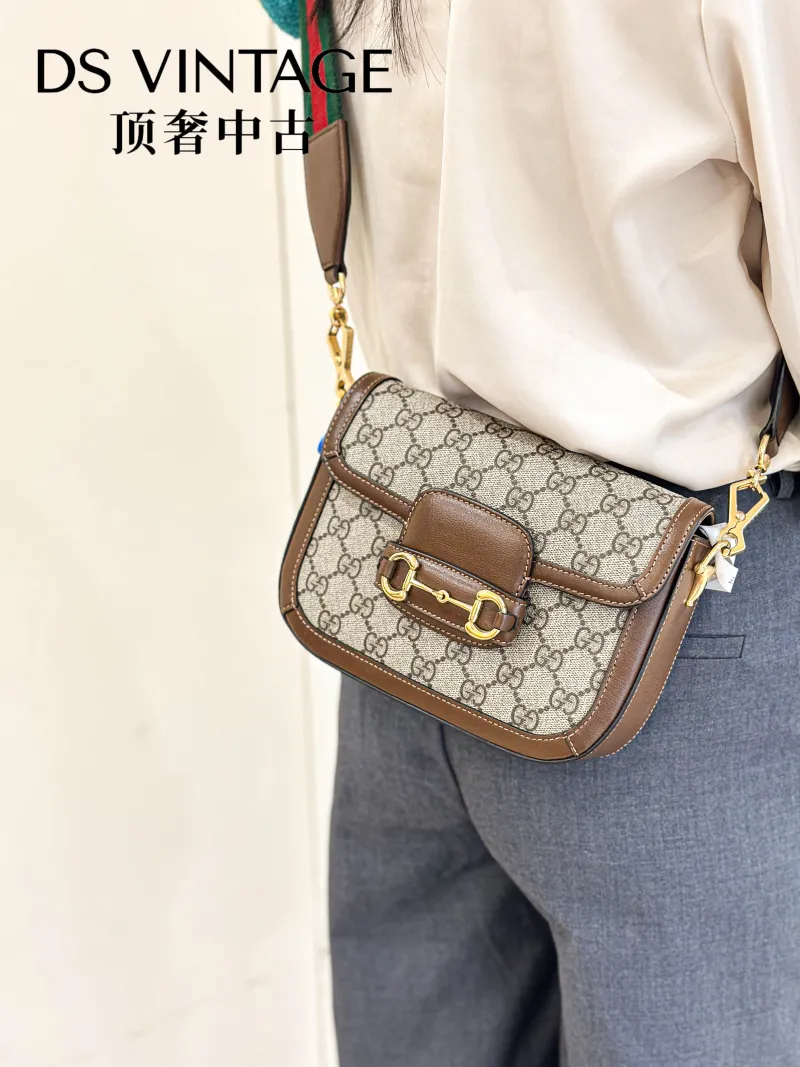 GUCCI Crossbody Bag Horsebit 1955 Horsebit Small Monogram PVC Small20.5 × 5 × 14.5 cm — on-model view 2 of 3