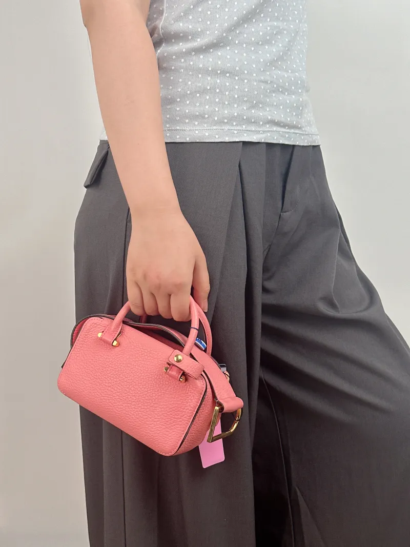DELVAUX Top Handle Bag Cool Box Box Shoulder Bag Pink Calfskin nano 16.5 × 7.5 × 10.5 cm — on-model view 1 of 3