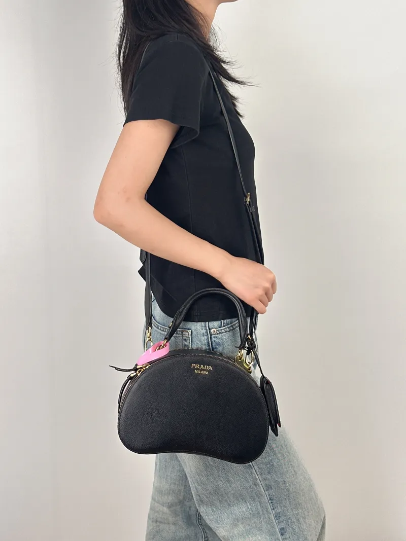 PRADA Shoulder Bag Black Calfskin One Size25 × 8 × 16 cm — on-model view 3 of 3