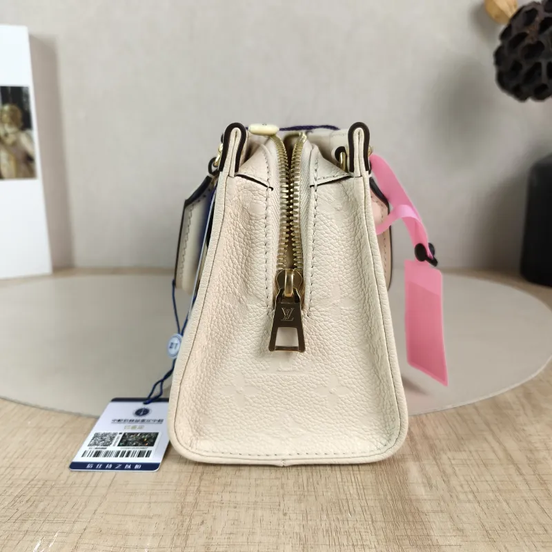 Louis Vuitton Crossbody Bag Onthego East West Two Straps White Empreinte Embossed Calfskin Small 25 × 10 × 13 cm — detail view 10 of 13