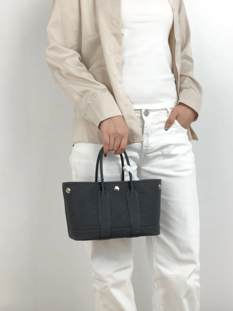 Hermès Top Handle Bag Neo Garden 23 Mini Negonda Calfskin Mini 23 × 10 × 16 cm G — on-model view 1 of 2