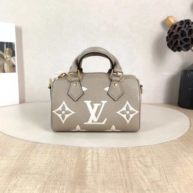 Louis Vuitton Crossbody Bag Speedy Nano · White Monogram Empreinte Embossed Calfskin nano 16 × 7.5 × 10 cm