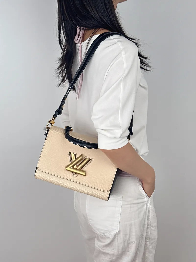 Louis Vuitton Crossbody Bag Twist Colorblock Epi Embossed Calfskin Medium23 × 9.5 × 17 cm — on-model view 1 of 3