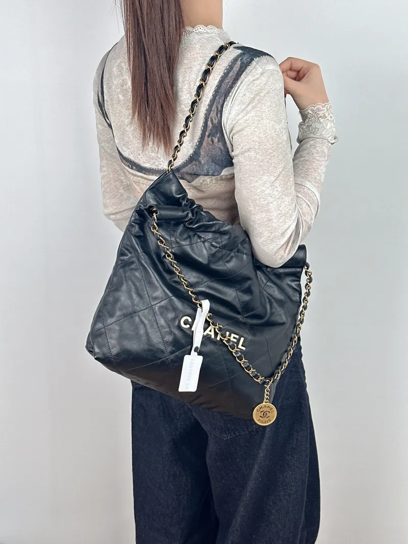 Chanel Shoulder Bag22Bag Black CC alfskin Small35 × 7 × 37 cm — on-model view 2 of 2