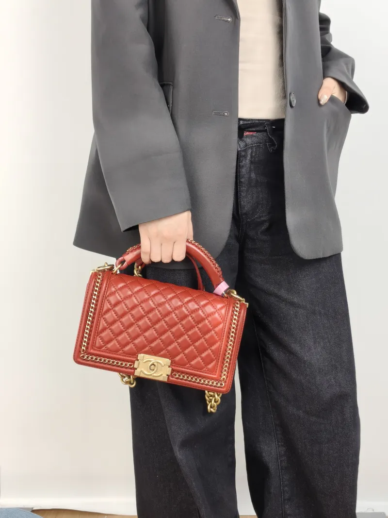 Chanel Crossbody Bag Le Boy​ Red Lambskin Medium 25 × 9 × 15 cm 24 — on-model view 1 of 3