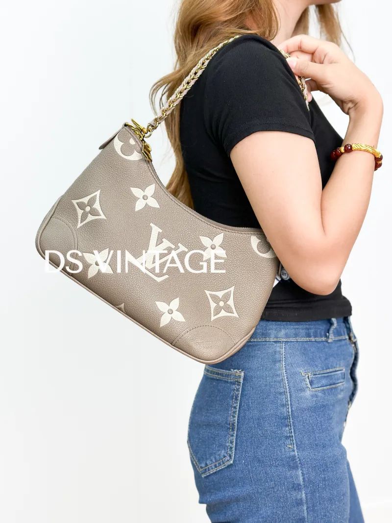 Louis Vuitton Crossbody Bag Boulogne Monogram Empreinte Embossed Calfskin Small 26 × 9.5 × 16 cm — on-model view 1 of 3