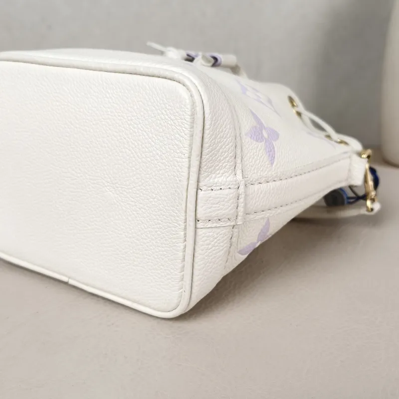 Louis Vuitton Crossbody Bag NANO NOÉ Bucket Bag Nano White · Monogram Empreinte Embossed Calfskin nano 13 × 10 × 16 cm — detail view 2 of 9