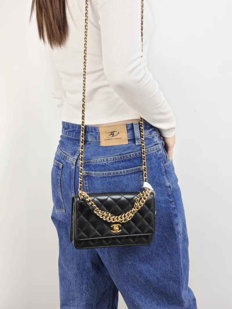 Chanel Crossbody Bag 24s woc Black Grained Calfskin Mini 19.2 × 3.5 × 12.3 cm — on-model view 3 of 3