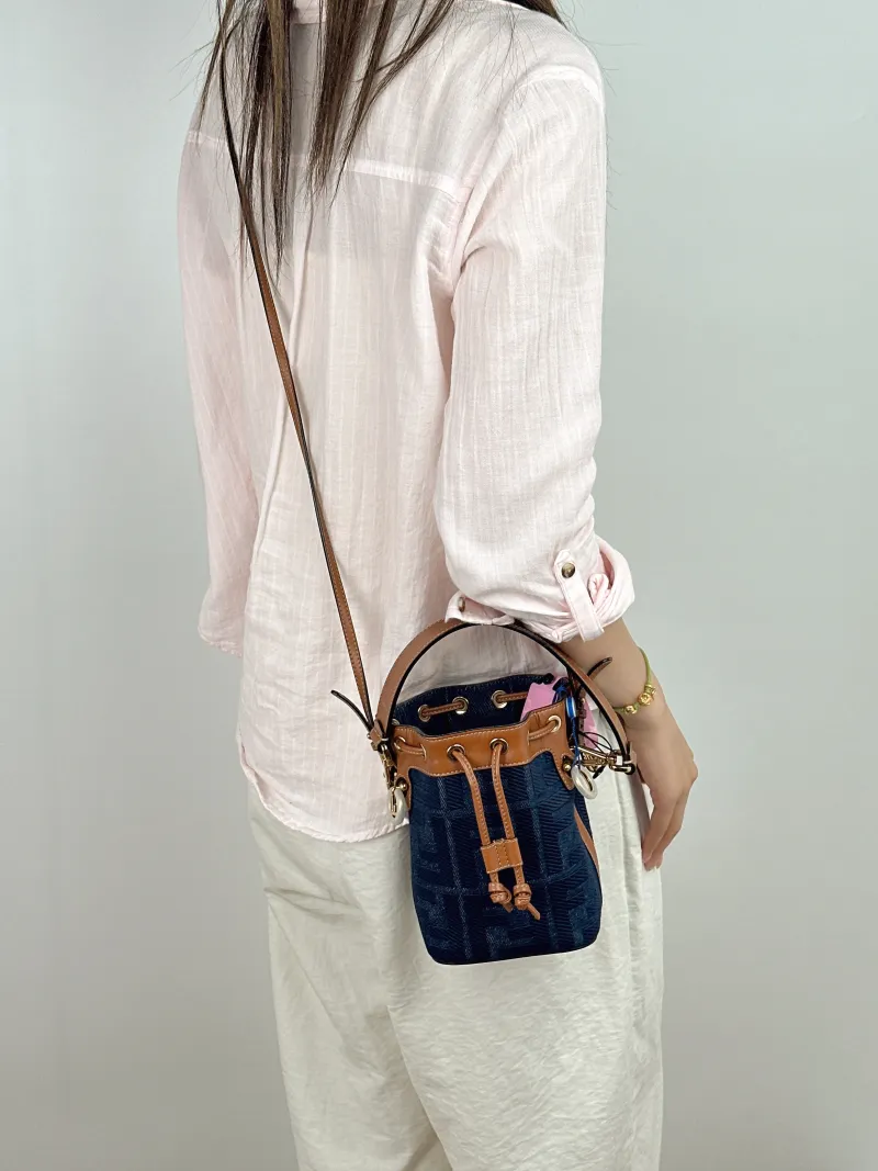 FENDI Crossbody Bag Mon Tresor Bucket Bag Blue Brown Calfskin，Canvas Mini 12 × 10 × 18 cm — on-model view 1 of 2