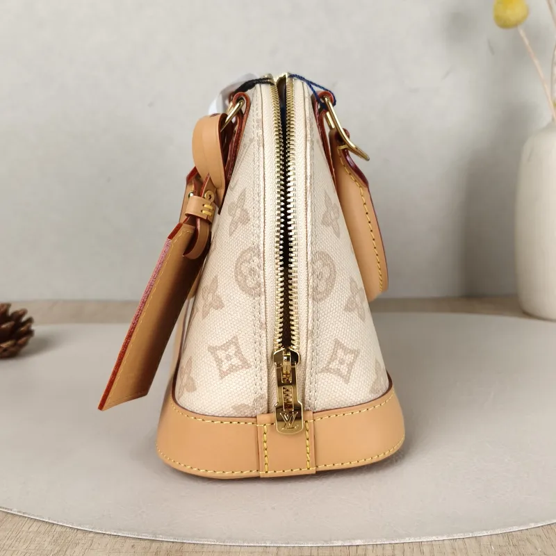 Louis Vuitton Top Handle Bag Alma BB PVCBB23.5 × 11.5 × 17.5 cm — detail view 11 of 12