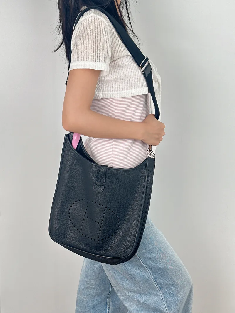 Hermès Crossbody Bag Evelyne 29 29Black Silver-Tone Hardware Clemence Taurillon TC Calfskin Small29 × 8 × 30 cm — on-model view 2 of 2