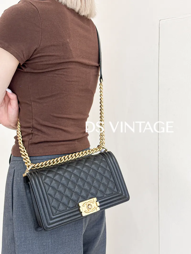 Chanel Crossbody Bag Le Boy​ Black Grained Calfskin Medium 25 × 9 × 15 cm 26 — on-model view 2 of 3