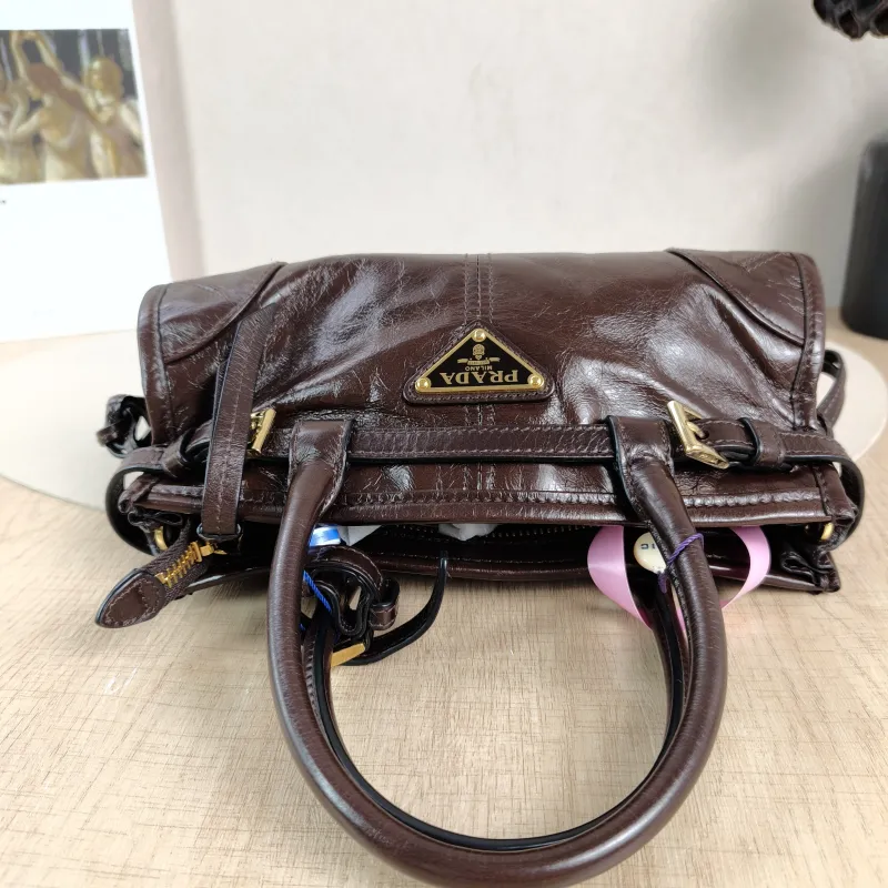 PRADA Top Handle Bag Bonnie Soft Lux Brown Waxed Leather Mini 23.5 × 9 × 12 cm — detail view 6 of 13