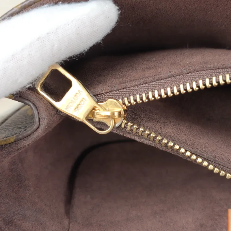 Louis Vuitton Crossbody Bag Pochette Métis East West Monogram PVC Small 21.5 × 6 × 13.5 cm — detail view 14 of 15
