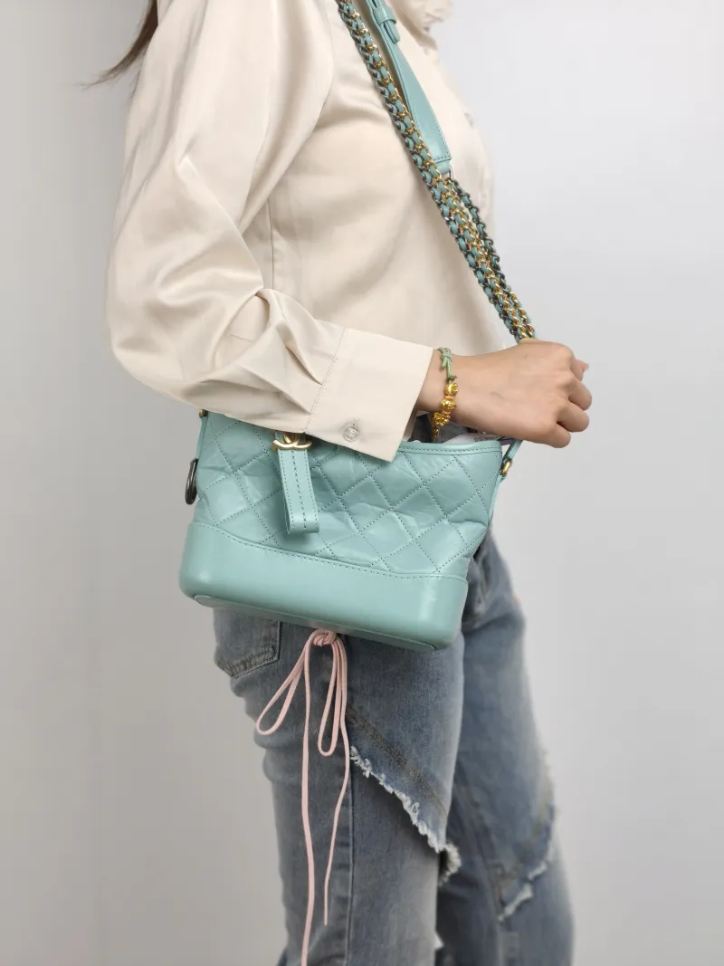 Chanel Crossbody Bag Gabrielle Gabrielle Bag Calfskin Small 20 × 8 × 15 cm 28 — on-model view 1 of 2