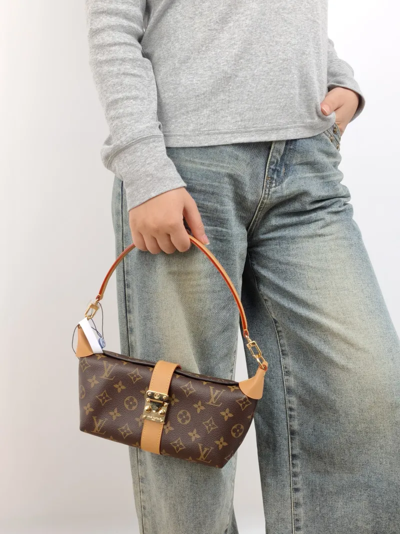 Louis Vuitton Shoulder Bag Pochette Mia Monogram PVC One Size 22 × 8 × 14.5 cm — on-model view 2 of 2