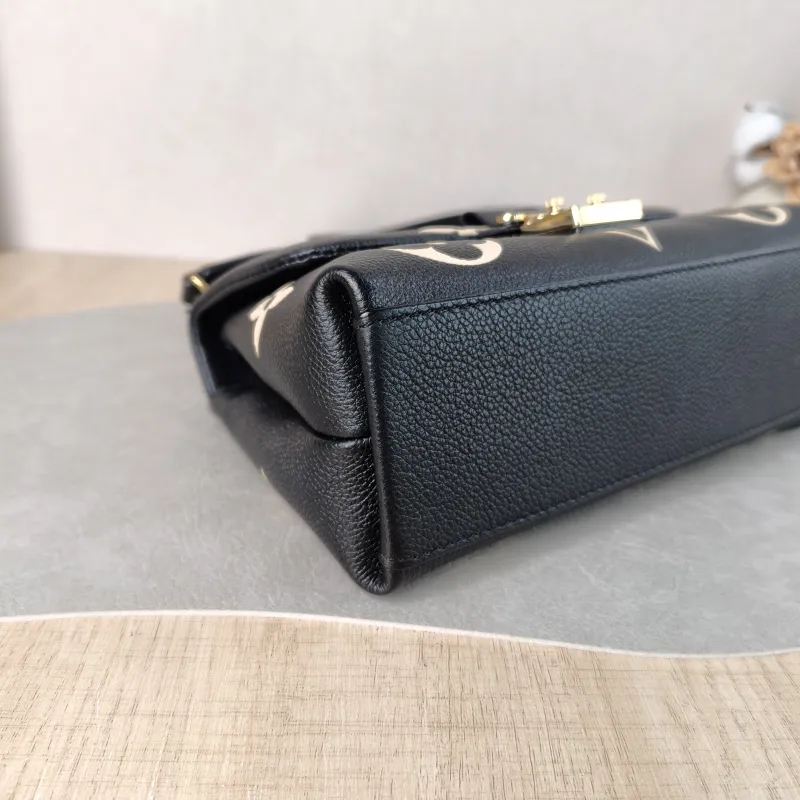 Louis Vuitton Crossbody Bag MADELEINE Black · White Monogram Empreinte Embossed Calfskin BB 24 × 8.5 × 17 cm — detail view 2 of 13