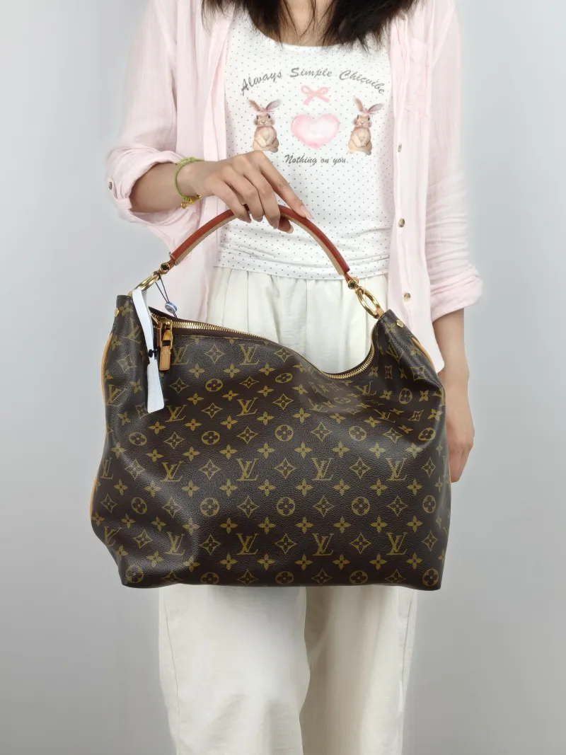 Louis Vuitton Shoulder Bag sully Shoulder Bag Monogram PVC Medium 35 × 14 × 31 cm — on-model view 1 of 3