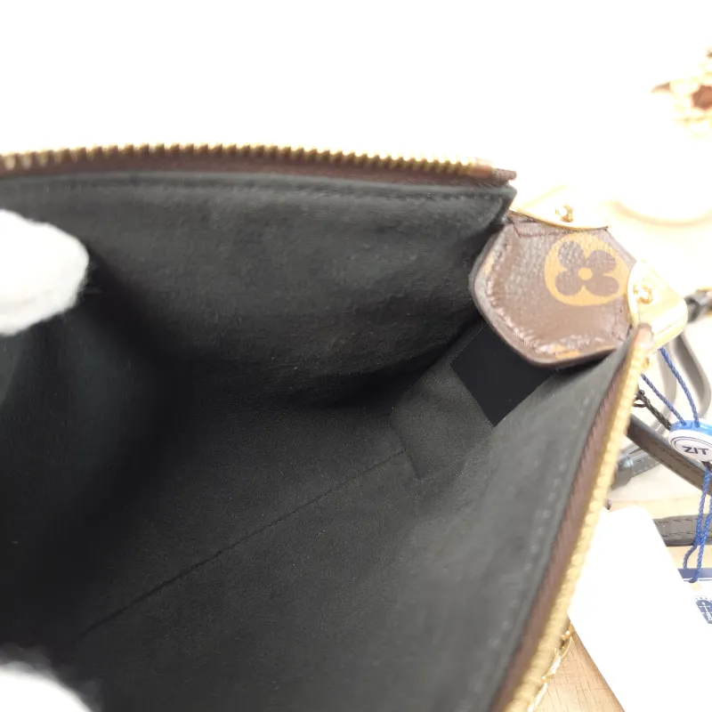 Louis Vuitton Crossbody Bag Slim Trunk Box Monogram PVC Medium 23 × 4 × 12 cm — detail view 9 of 10