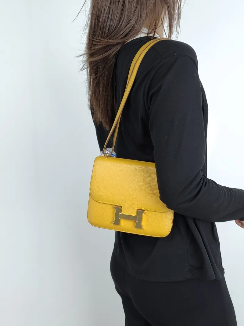Hermès Crossbody Bag Constance 19 Gold-Tone Hardware Epsom Calfskinmini18 × 4 × 15 cm Conditioned — on-model view 1 of 4