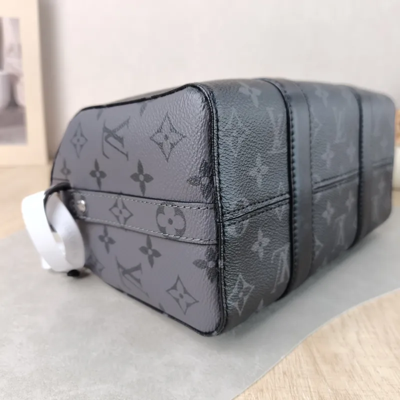 Louis Vuitton Crossbody Bag City Keepall Black PVC Medium 27 × 13 × 17 cm — detail view 1 of 11
