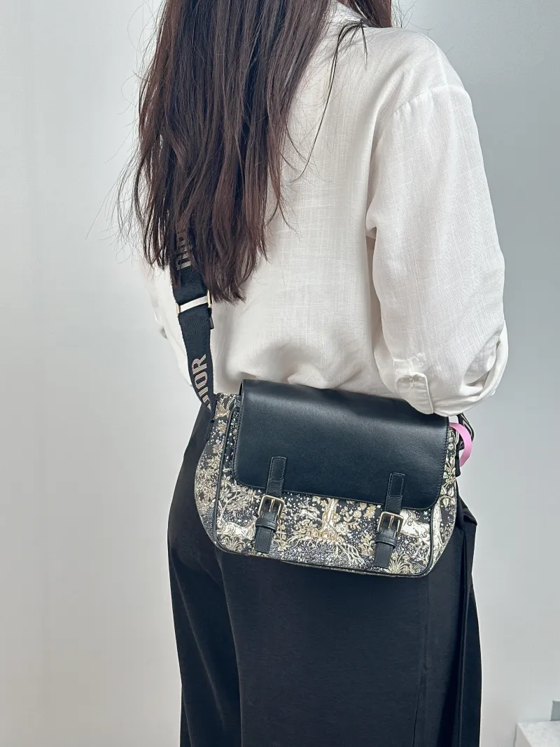 DIOR Crossbody Bag Magica Messenger Messenger Bag Black Canvas · Calfskin Small 21 × 8 × 17 cm — on-model view 1 of 2