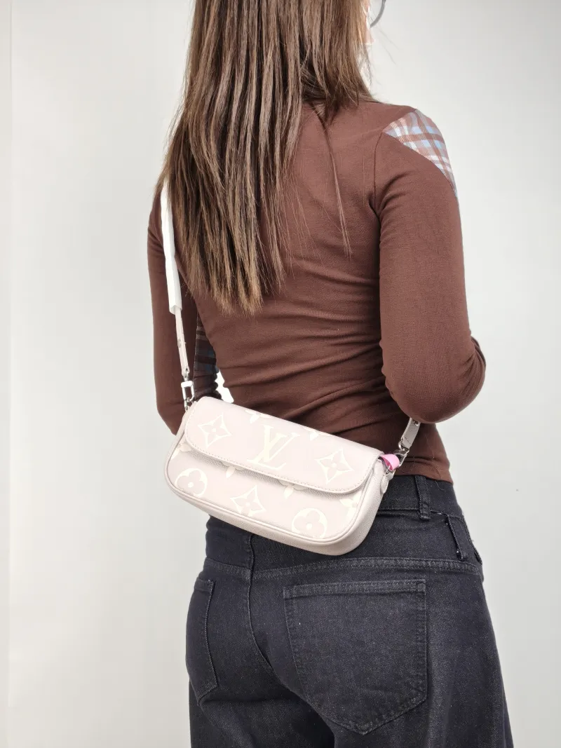 Louis Vuitton Crossbody Bag IVY Grey · White Monogram Empreinte Embossed Calfskin Small 23.5 × 4.3 × 12 cm — on-model view 2 of 2