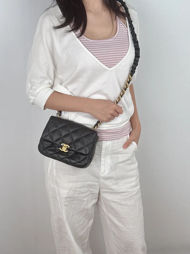 Chanel Crossbody Bag Crossbody Bag Black with Gold-Tone Hardware Lambskin One Size 18 × 5 × 15 cm — on-model view 1 of 2