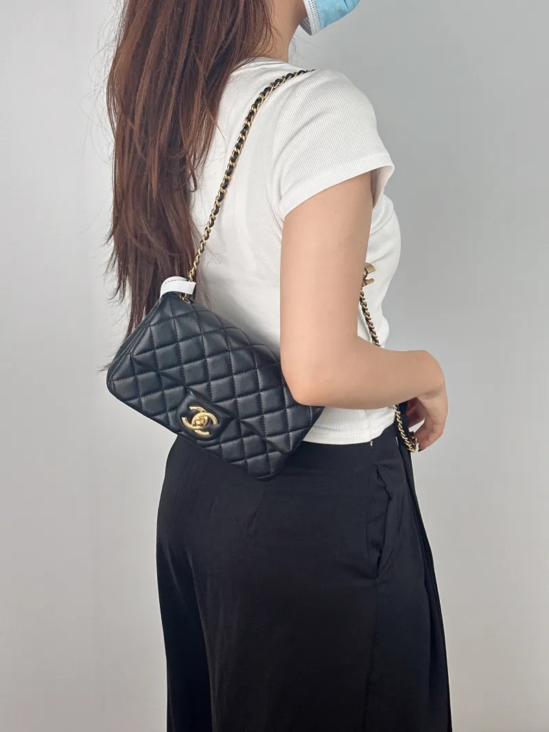 Chanel Crossbody Bag c mini Black Lambskin mini20 × 6 × 12 cm — on-model view 2 of 2