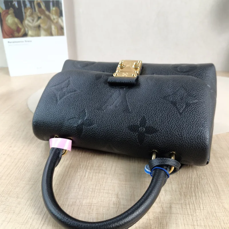 Louis Vuitton Crossbody Bag MADELEINE Black Empreinte Embossed Calfskin BB 24 × 8.5 × 17 cm — detail view 7 of 15