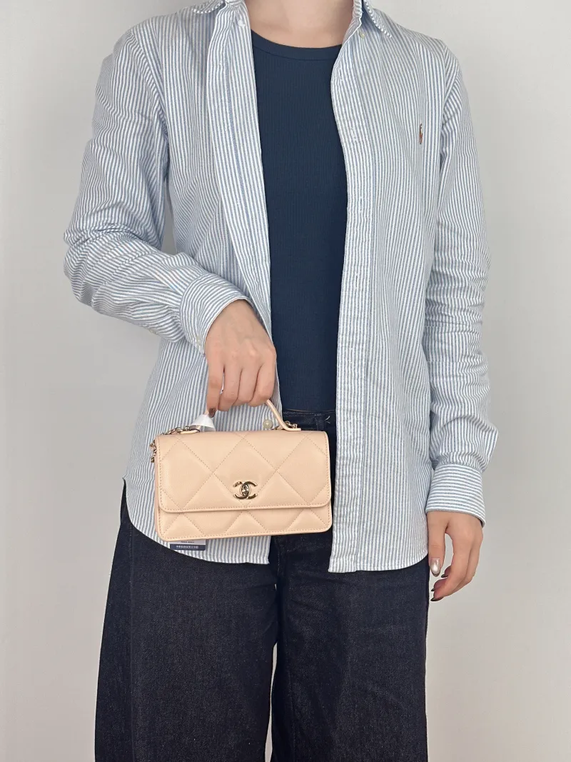 Chanel Crossbody Bag woc Pink Grained Calfskin One Size 19.2 × 3.5 × 12.3 cm — on-model view 1 of 3