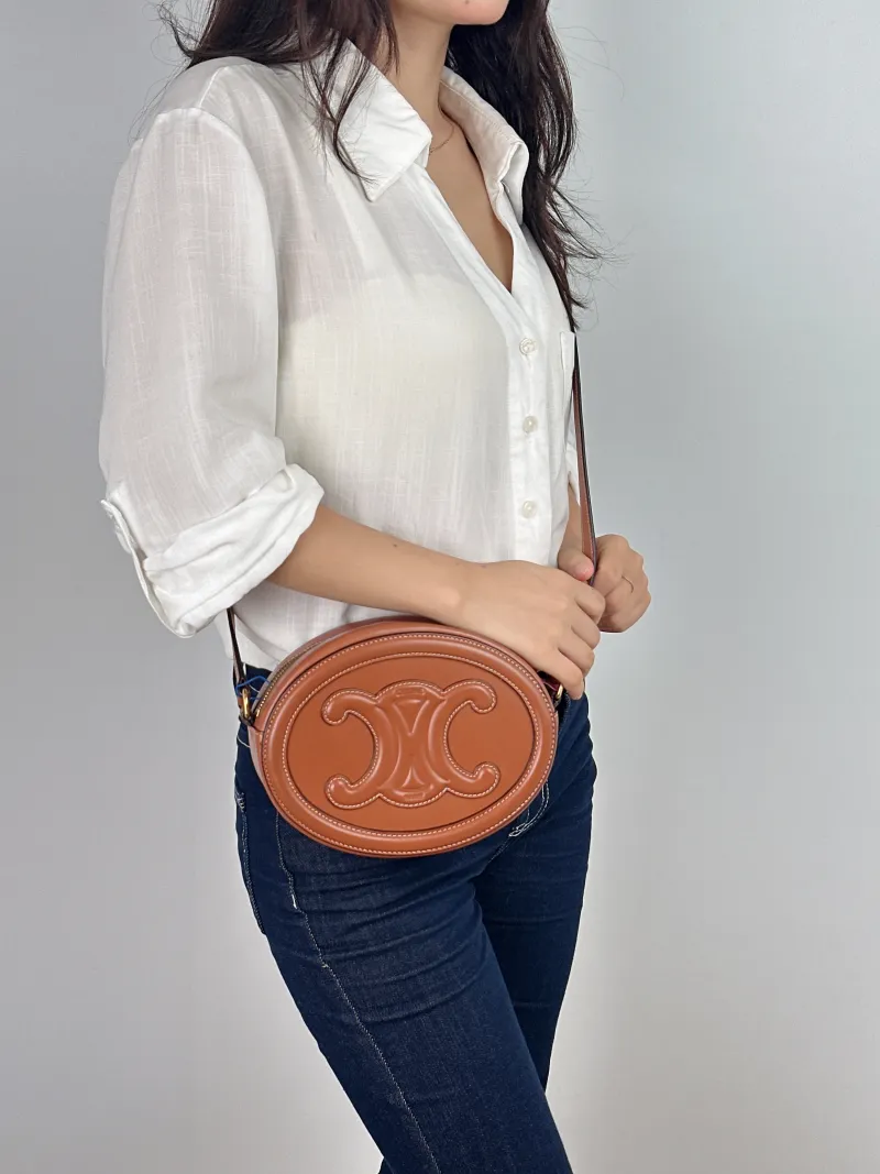 CELINE Crossbody Bag Cuir Triomphe Brown Calfskin Large 20 × 6 × 15 cm — on-model view 2 of 2