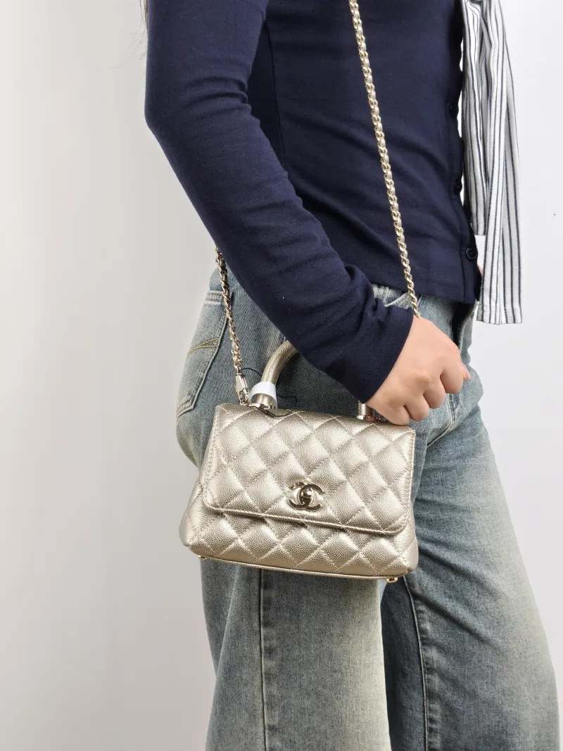 Chanel Crossbody Bag Coco Handle​ Grained Calfskin Mini 19 × 9 × 13 cm — on-model view 3 of 3