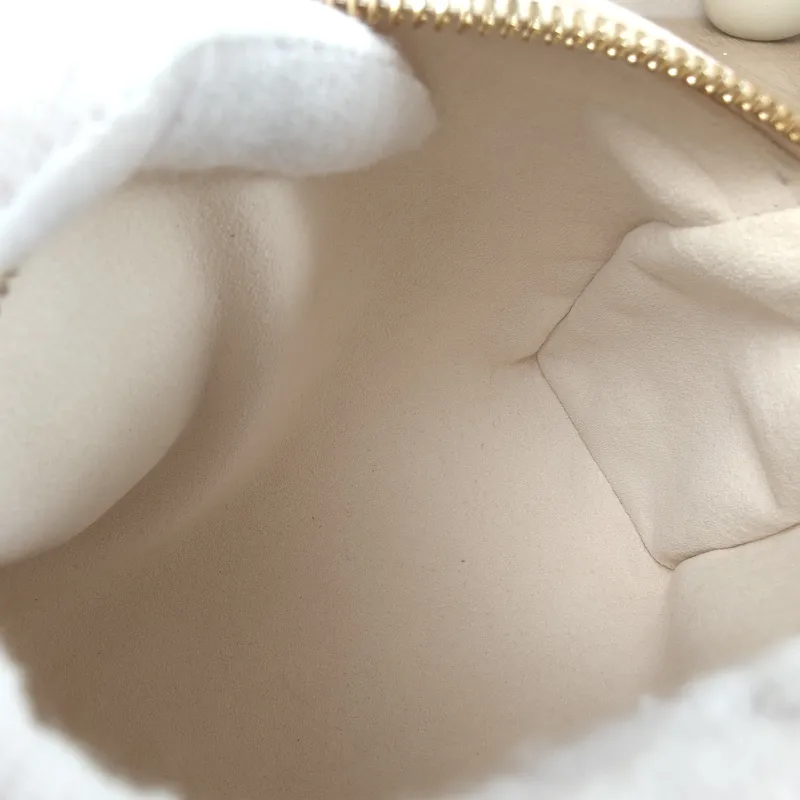 Louis Vuitton Crossbody Bag Speedy Nano Monogram Empreinte Embossed Calfskin nano 16 × 7.5 × 10 cm — detail view 10 of 12