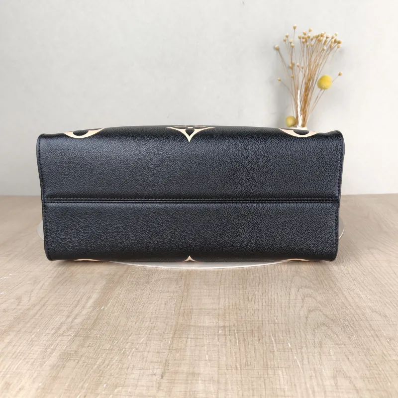 Louis Vuitton Shoulder Bag Onthego Medium Black · White Empreinte Embossed Calfskin Monogram Medium35 × 14 × 27 cm — cover view 3 of 5