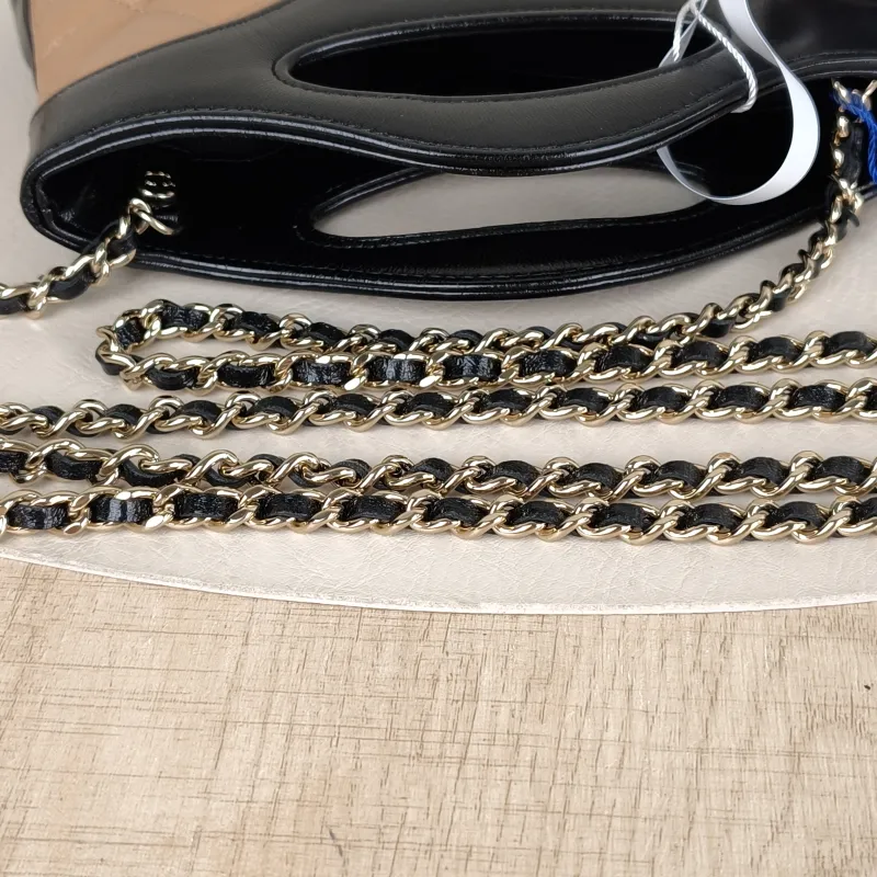 Chanel Crossbody Bag31Bag Beige · Black Waxed Leathernano19 × 5 × 12 cm — detail view 1 of 14