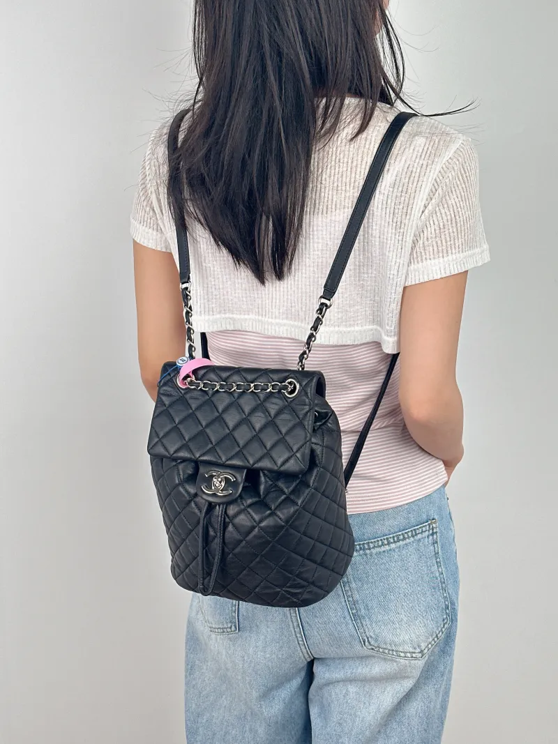 Chanel Backpack 23s Backpack Black Lambskin Large 20 × 12 × 25 cm 22 — on-model view 1 of 3