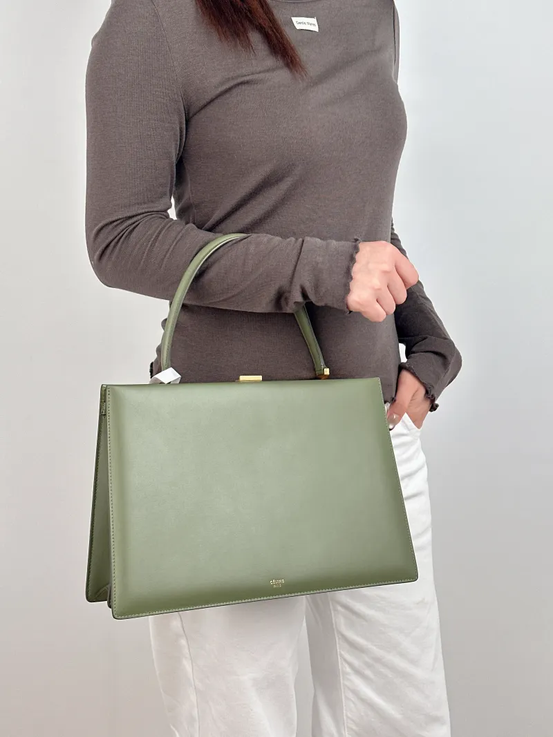 CELINE Top Handle Bag clasp Top Handle Bag Calfskin One Size 32.5 × 10 × 22 cm — on-model view 1 of 2