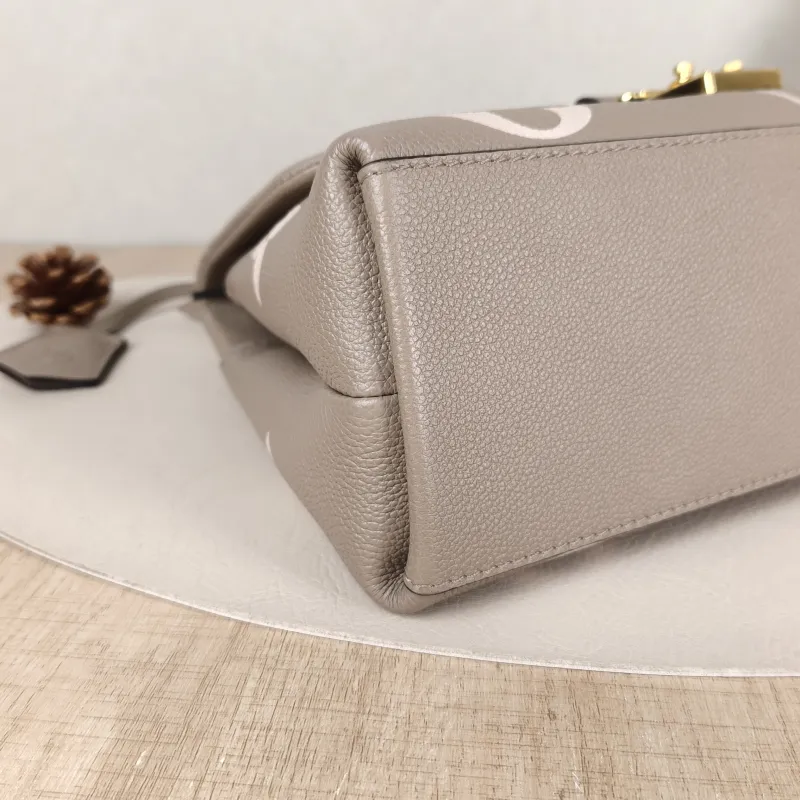 Louis Vuitton Crossbody Bag MADELEINE Empreinte Embossed Calfskin Medium30 × 11 × 19.5 cm — detail view 5 of 14