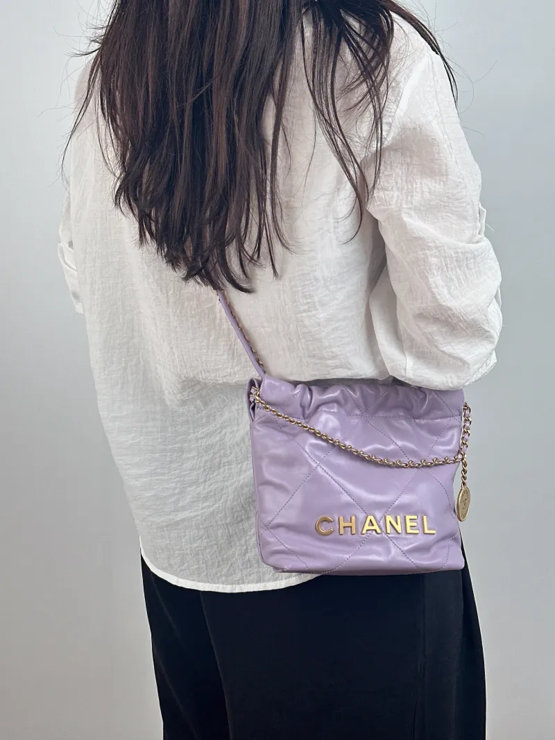 Chanel Crossbody Bag 22Bag Calfskin Mini 20 × 6 × 19 cm — on-model view 1 of 2