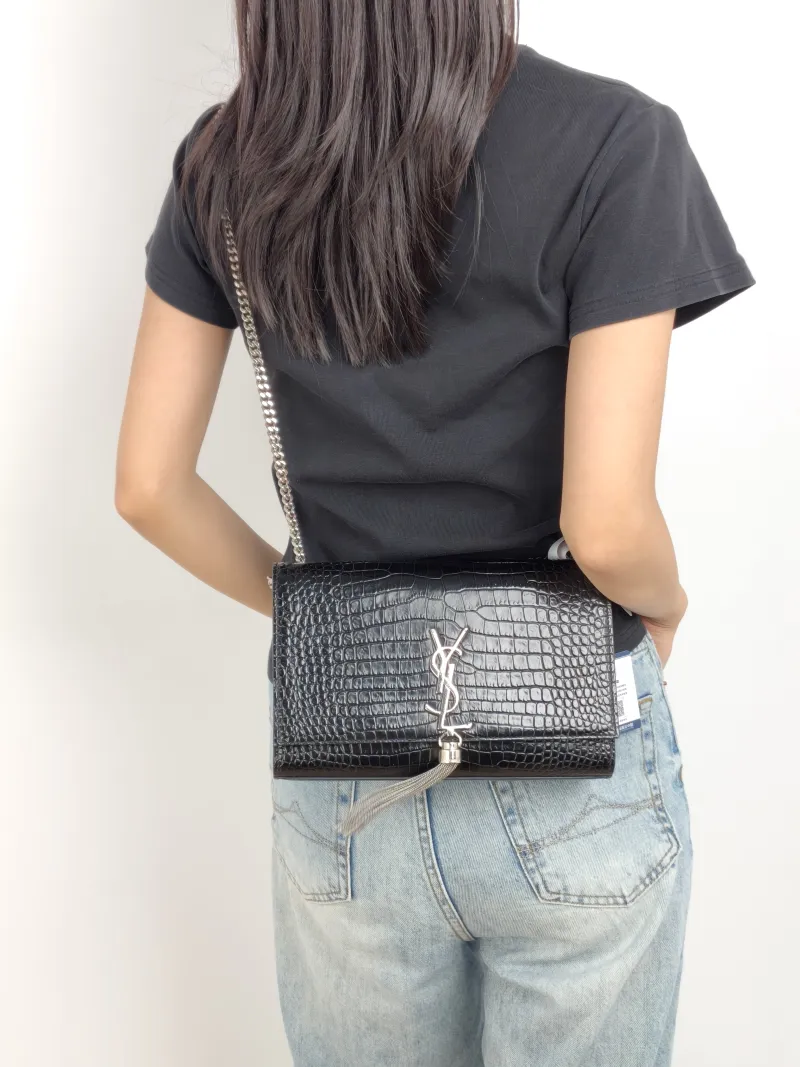 SAINT LAURENT Crossbody Bag KATE Edition Black Calfskin Medium 24 × 5.5 × 14.5 cm — on-model view 2 of 3