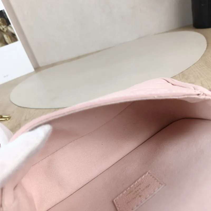 Louis Vuitton Crossbody Bag Diane Baguette Bag Monogram Empreinte Embossed Calfskin nano 19 × 6 × 10.5 cm — detail view 3 of 13