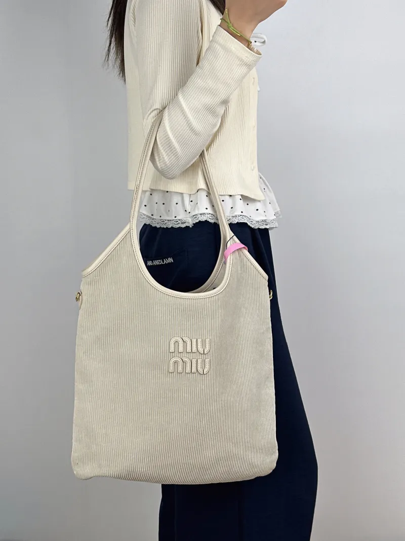 Miumiu Shoulder Bag IVY Tote Shopping Tote White Medium35*40 — on-model view 1 of 2