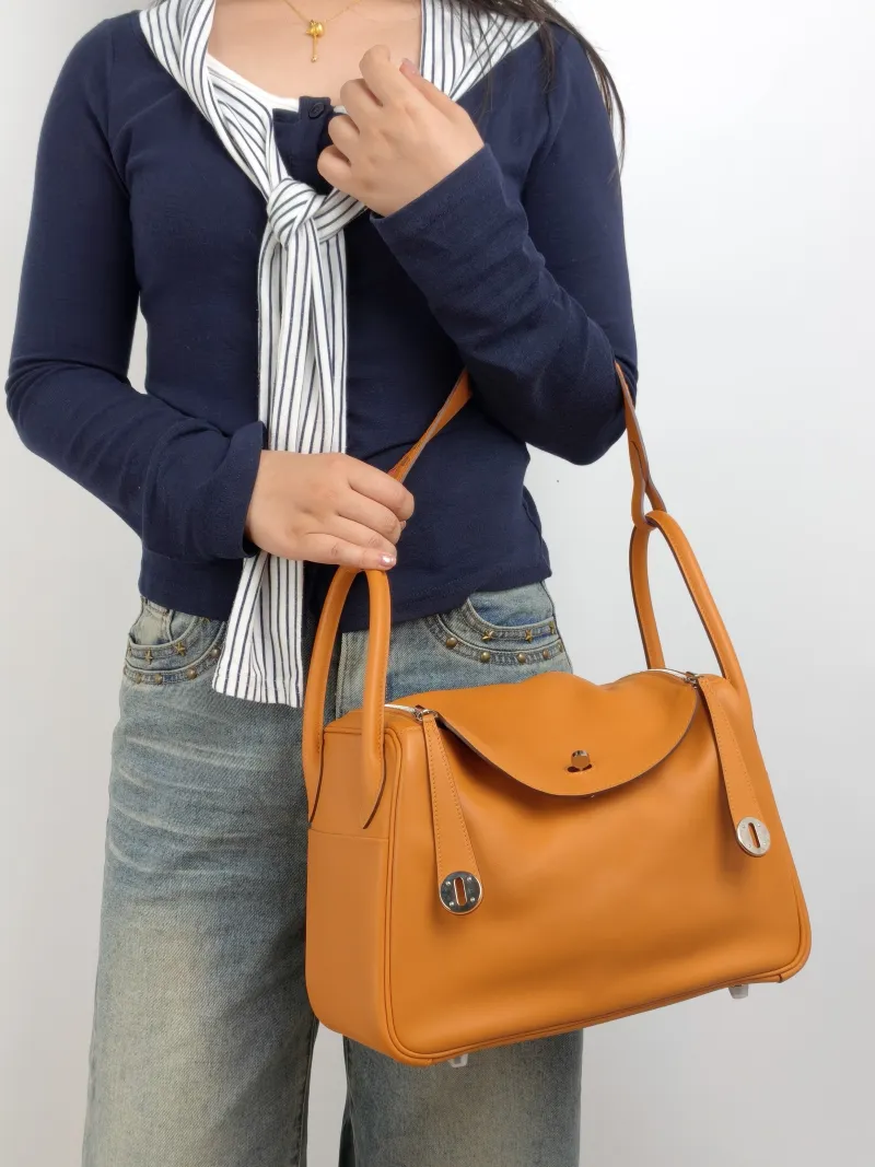 Hermès Crossbody Bag Lindy 30 Taurillon Clemence TC Calfskin 30 30 × 15 × 19 cm D — on-model view 2 of 2